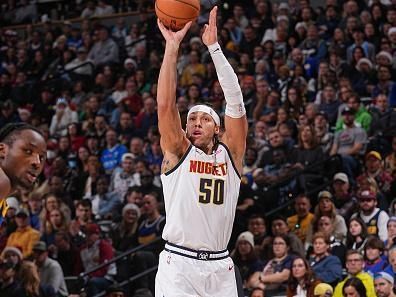 DENVER, CO - DECEMBER 25: Aaron Gordon #50 of the Denver Nuggets three point basket during the game against the Golden State Warriors on December 25, 2023 at the Ball Arena in Denver, Colorado. NOTE TO USER: User expressly acknowledges and agrees that, by downloading and/or using this Photograph, user is consenting to the terms and conditions of the Getty Images License Agreement. Mandatory Copyright Notice: Copyright 2023 NBAE (Photo by Bart Young/NBAE via Getty Images)