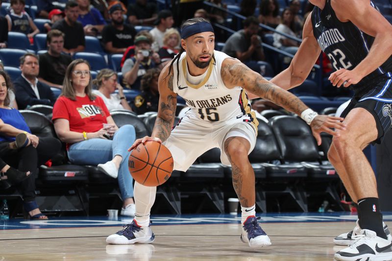 NEW ORLEANS, LA - OCTOBER 7: Jose Alvarado #15 of the New Orleans Pelicans dribbles the ball during the game against the Orlando Magic on October 7, 2024 at the Smoothie King Center in New Orleans, Louisiana. NOTE TO USER: User expressly acknowledges and agrees that, by downloading and or using this Photograph, user is consenting to the terms and conditions of the Getty Images License Agreement. Mandatory Copyright Notice: Copyright 2024 NBAE (Photo by Layne Murdoch Jr./NBAE via Getty Images)