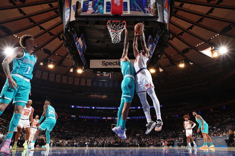 NEW YORK, NY - OCTOBER 15: Precious Achiuwa #5 of the New York Knicks drives to the basket during the game against the Charlotte Hornets during the 2024 NBA Preseason on October 15, 2024 at Madison Square Garden in New York City, New York.  NOTE TO USER: User expressly acknowledges and agrees that, by downloading and or using this photograph, User is consenting to the terms and conditions of the Getty Images License Agreement. Mandatory Copyright Notice: Copyright 2024 NBAE  (Photo by Nathaniel S. Butler/NBAE via Getty Images)