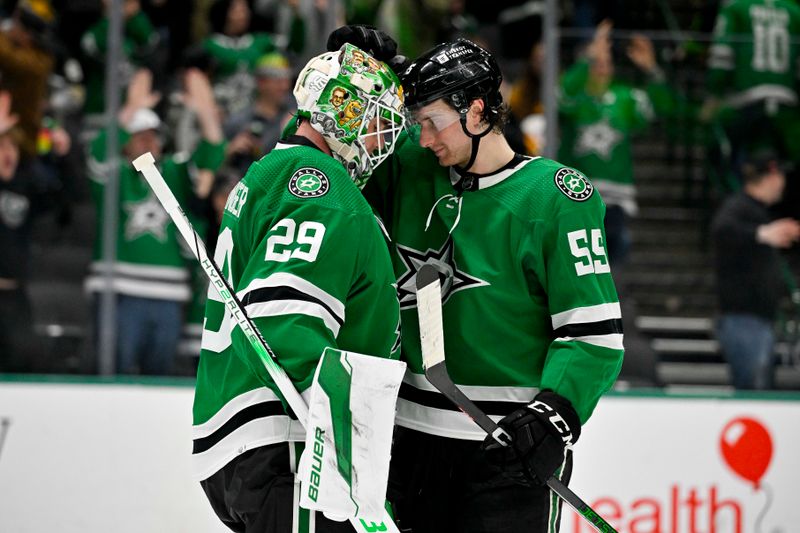 Mar 22, 2024; Dallas, Texas, USA; Dallas Stars goaltender Jake Oettinger (29) and defenseman Thomas Harley (55) celebrate the Stars win over the Pittsburgh Penguins at the American Airlines Center. Mandatory Credit: Jerome Miron-USA TODAY Sports