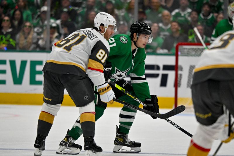 Apr 24, 2024; Dallas, Texas, USA; Vegas Golden Knights right wing Jonathan Marchessault (81) and Dallas Stars left wing Jason Robertson (21) look for the puck at center ice during the second period in game two of the first round of the 2024 Stanley Cup Playoffs at American Airlines Center. Mandatory Credit: Jerome Miron-USA TODAY Sports