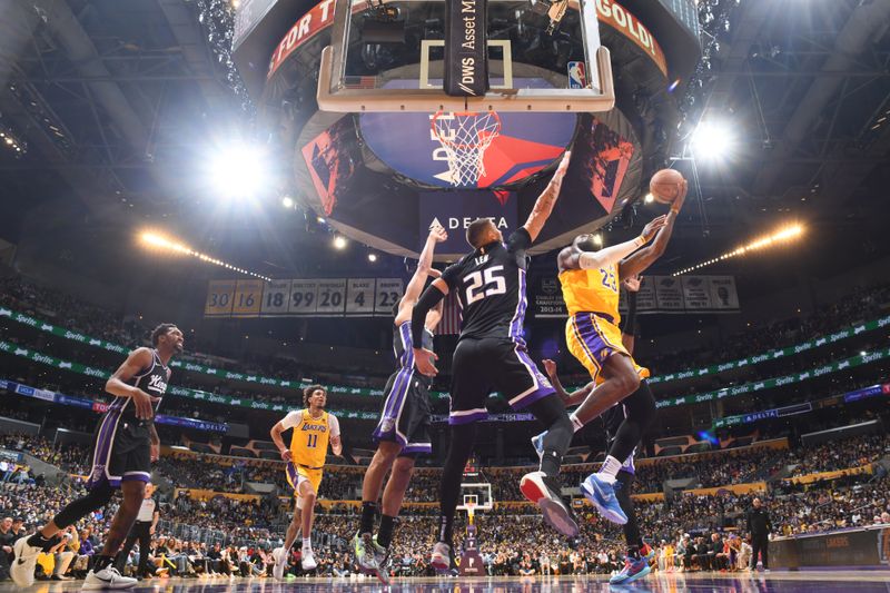 LOS ANGELES, CA - MARCH 6: LeBron James #23 of the Los Angeles Lakers drives to the basket during the game against the Sacramento Kings on March 6, 2024 NBAE at Crypto.Com Arena in Los Angeles, California. NOTE TO USER: User expressly acknowledges and agrees that, by downloading and/or using this Photograph, user is consenting to the terms and conditions of the Getty Images License Agreement. Mandatory Copyright Notice: Copyright 2024 NBAE (Photo by Juan Ocampo/NBAE via Getty Images)