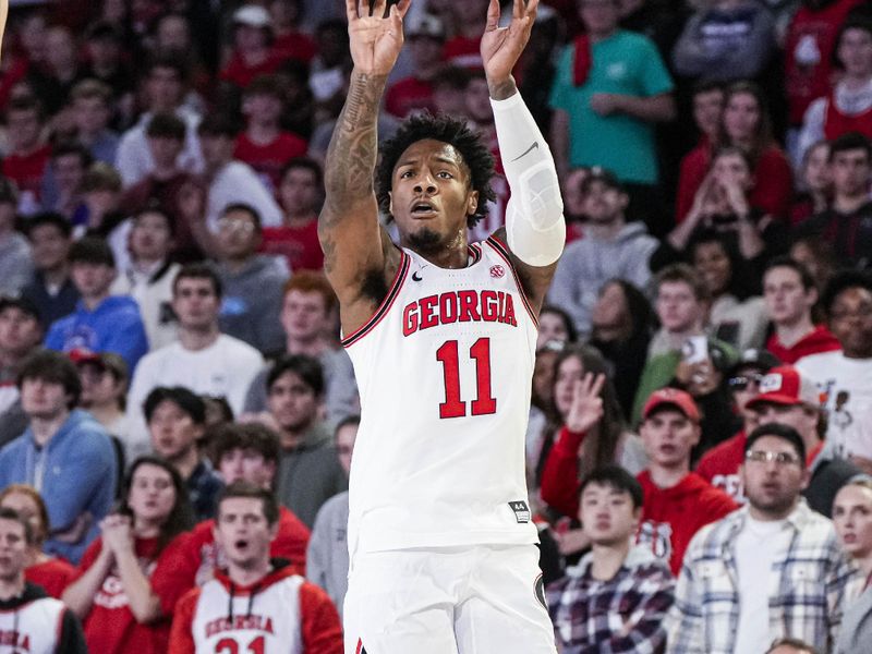 Dec 5, 2023; Athens, Georgia, USA; Georgia Bulldogs guard Justin Hill (11) shoots against the Georgia Tech Yellow Jackets at Stegeman Coliseum. Mandatory Credit: Dale Zanine-USA TODAY Sports