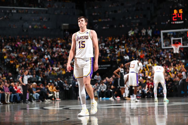 BROOKLYN, NY - MARCH 31: Austin Reaves #15 of the Los Angeles Lakers looks on during the game on March 31, 2024 at Barclays Center in Brooklyn, New York. NOTE TO USER: User expressly acknowledges and agrees that, by downloading and or using this Photograph, user is consenting to the terms and conditions of the Getty Images License Agreement. Mandatory Copyright Notice: Copyright 2024 NBAE (Photo by David L. Nemec/NBAE via Getty Images)