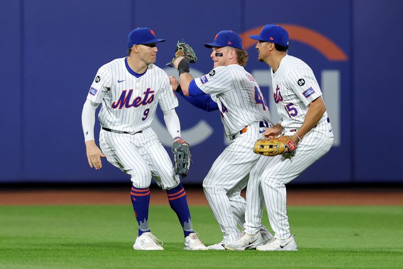 Sep 4, 2024; New York City, New York, USA; New York Mets left fielder Brandon Nimmo (9) and center fielder Harrison Bader (44) and right fielder Tyrone Taylor (15) celebrate after defeating the Boston Red Sox at Citi Field. Mandatory Credit: Brad Penner-Imagn Images