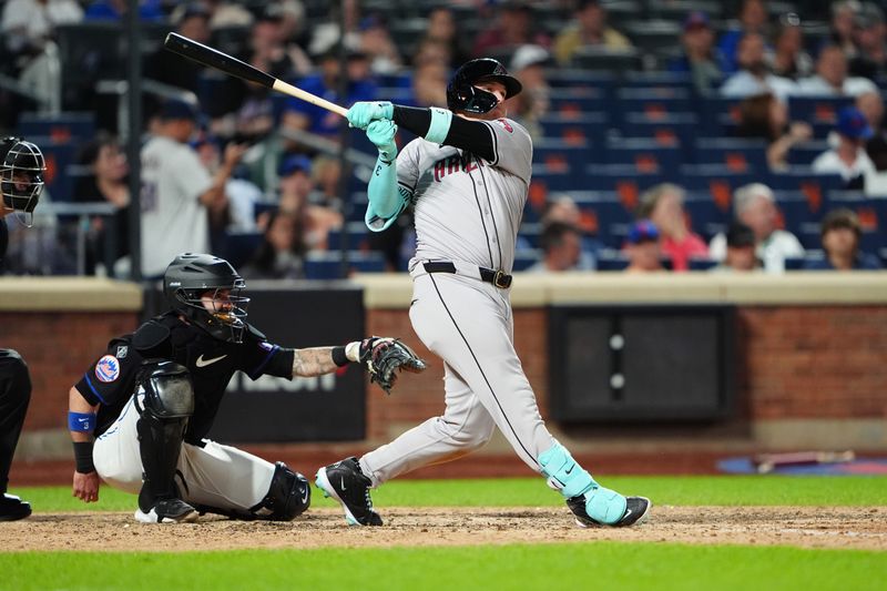 May 31, 2024; New York City, New York, USA; Arizona Diamondbacks designated hitter Joc Pederson (3) hits a three-run home run against the New York Mets during the ninth inning at Citi Field. Mandatory Credit: Gregory Fisher-USA TODAY Sports