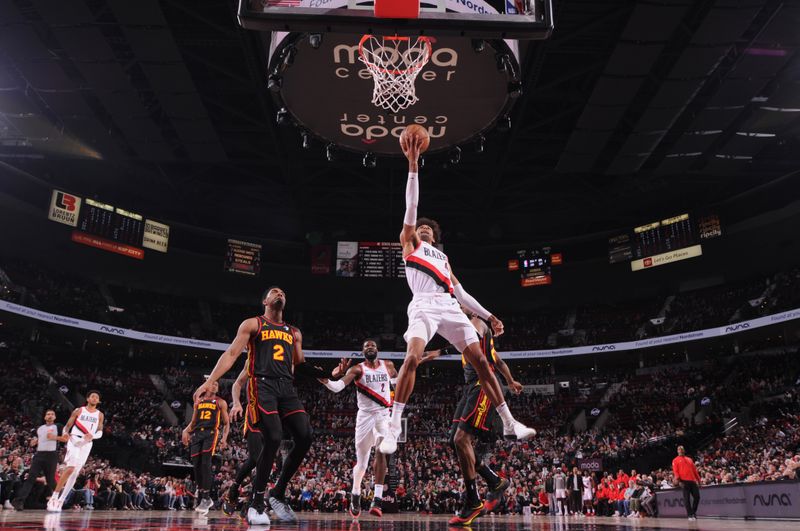 PORTLAND, OR - MARCH 13:  Matisse Thybulle #4 of the Portland Trail Blazers goes to the basket during the game on March 13, 2024 at the Moda Center Arena in Portland, Oregon. NOTE TO USER: User expressly acknowledges and agrees that, by downloading and or using this photograph, user is consenting to the terms and conditions of the Getty Images License Agreement. Mandatory Copyright Notice: Copyright 2024 NBAE (Photo by Cameron Browne/NBAE via Getty Images)