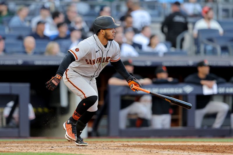 Apr 1, 2023; Bronx, New York, USA; San Francisco Giants second baseman Thairo Estrada (39) follows through on an RBI infield single against the New York Yankees during the sixth inning at Yankee Stadium. Mandatory Credit: Brad Penner-USA TODAY Sports