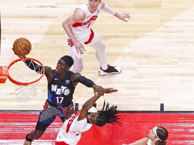 TORONTO, CANADA - MARCH 25: Dennis Schroder #17 of the Brooklyn Nets drives to the basket during the game against the Toronto Raptors on March 25, 2024 at the Scotiabank Arena in Toronto, Ontario, Canada.  NOTE TO USER: User expressly acknowledges and agrees that, by downloading and or using this Photograph, user is consenting to the terms and conditions of the Getty Images License Agreement.  Mandatory Copyright Notice: Copyright 2024 NBAE (Photo by Vaughn Ridley/NBAE via Getty Images)