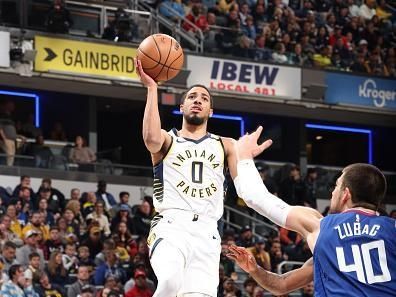 INDIANAPOLIS, IN - DECEMBER 18:  Tyrese Haliburton #0 of the Indiana Pacers drives to the basket during the game against the LA Clippers on December 18, 2023 at Gainbridge Fieldhouse in Indianapolis, Indiana. NOTE TO USER: User expressly acknowledges and agrees that, by downloading and or using this Photograph, user is consenting to the terms and conditions of the Getty Images License Agreement. Mandatory Copyright Notice: Copyright 2023 NBAE (Photo by Jeff Haynes/NBAE via Getty Images)