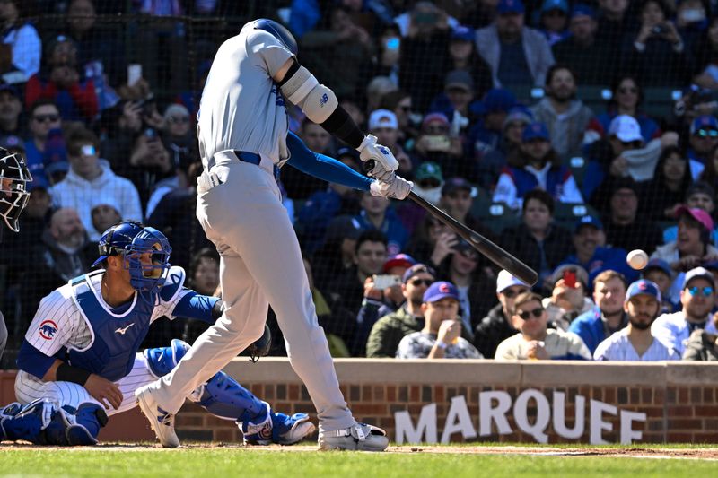 Apr 6, 2024; Chicago, Illinois, USA;  Los Angeles Dodgers two-way player Shohei Ohtani (17) singles against the Chicago Cubs during the first inning at Wrigley Field. Mandatory Credit: Matt Marton-USA TODAY Sports