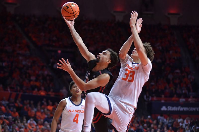 Jan 21, 2024; Champaign, Illinois, USA; Rutgers Scarlet Knights guard Noah Fernandes (1) drives to the basket as Illinois Fighting Illini forward Coleman Hawkins (33) defends during the second half at State Farm Center. Mandatory Credit: Ron Johnson-USA TODAY Sports