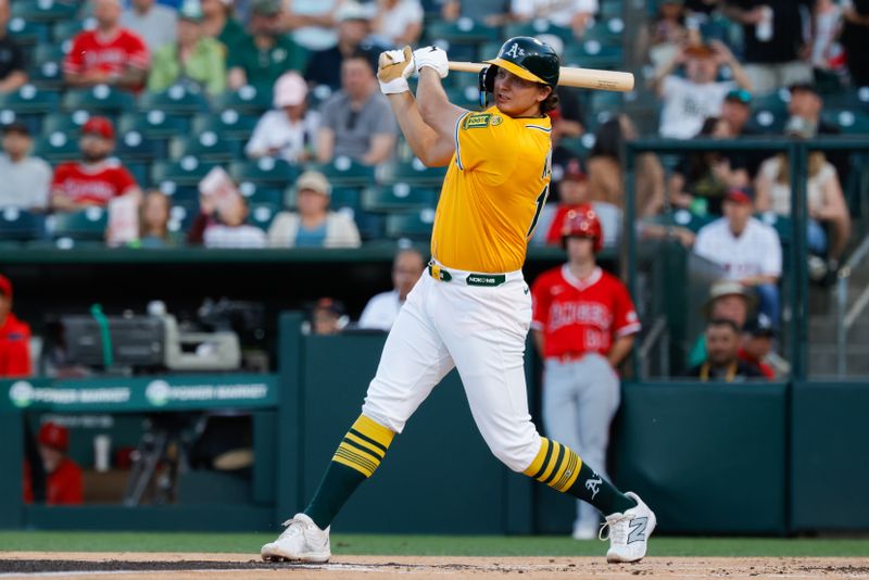 May 20, 2025; West Sacramento, California, USA; Athletics first baseman Nick Kurtz (16) hits a single during the second inning against the Los Angeles Angels at Sutter Health Park. Mandatory Credit: Sergio Estrada-Imagn Images