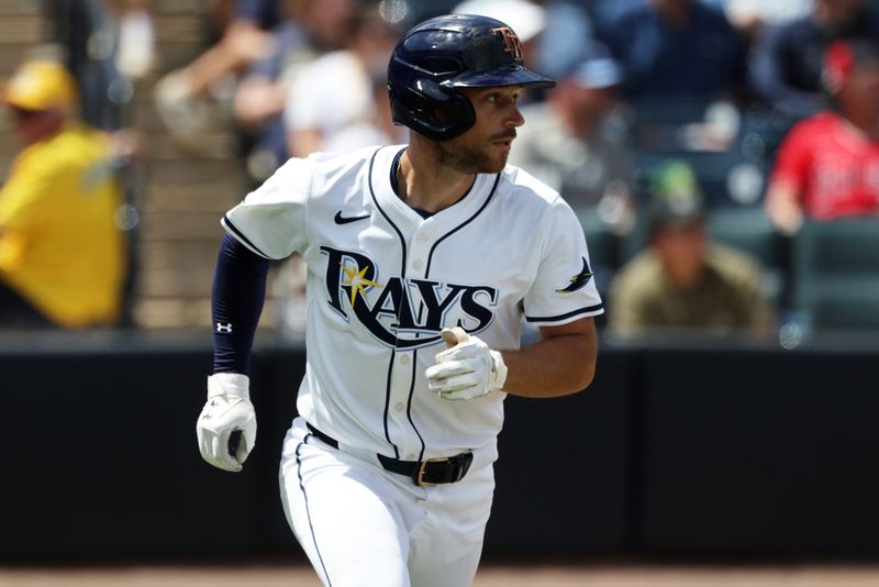 Apr 10, 2025; Tampa, Fl, USA;  Tampa Bay Rays second base Brandon Lowe (8) singles during the sixth inning against the Los Angeles Angels at George M. Steinbrenner Field. Mandatory Credit: Kim Klement Neitzel-Imagn Images