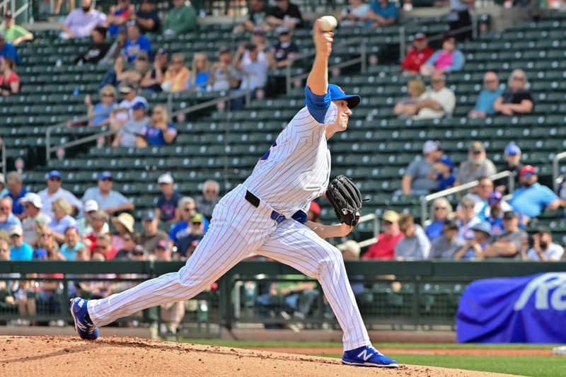 Feb 27, 2024; Mesa, Arizona, USA;  Chicago Cubs starting pitcher Kyle Hendricks (28) throws in the first inning against the Cincinnati Reds during a spring training game at Sloan Park. Mandatory Credit: Matt Kartozian-USA TODAY Sports