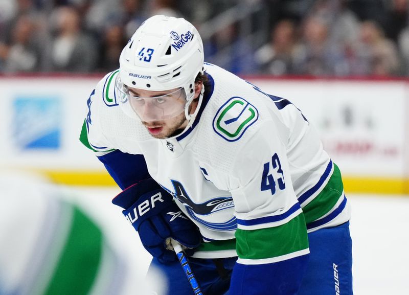 Nov 22, 2023; Denver, Colorado, USA; Vancouver Canucks defenseman Quinn Hughes (43) during the third period against the Colorado Avalanche at Ball Arena. Mandatory Credit: Ron Chenoy-USA TODAY Sports