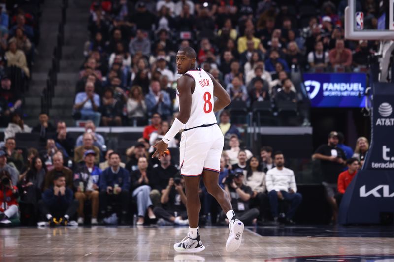 INGLEWOOD, CA - NOVEMBER 9: Kris Dunn #8 of the LA Clippers celebrates during the game against the Toronto Raptors on November 9, 2024 at Intuit Dome in Los Angeles, California. NOTE TO USER: User expressly acknowledges and agrees that, by downloading and/or using this Photograph, user is consenting to the terms and conditions of the Getty Images License Agreement. Mandatory Copyright Notice: Copyright 2024 NBAE (Photo by Jessie Alcheh/NBAE via Getty Images)