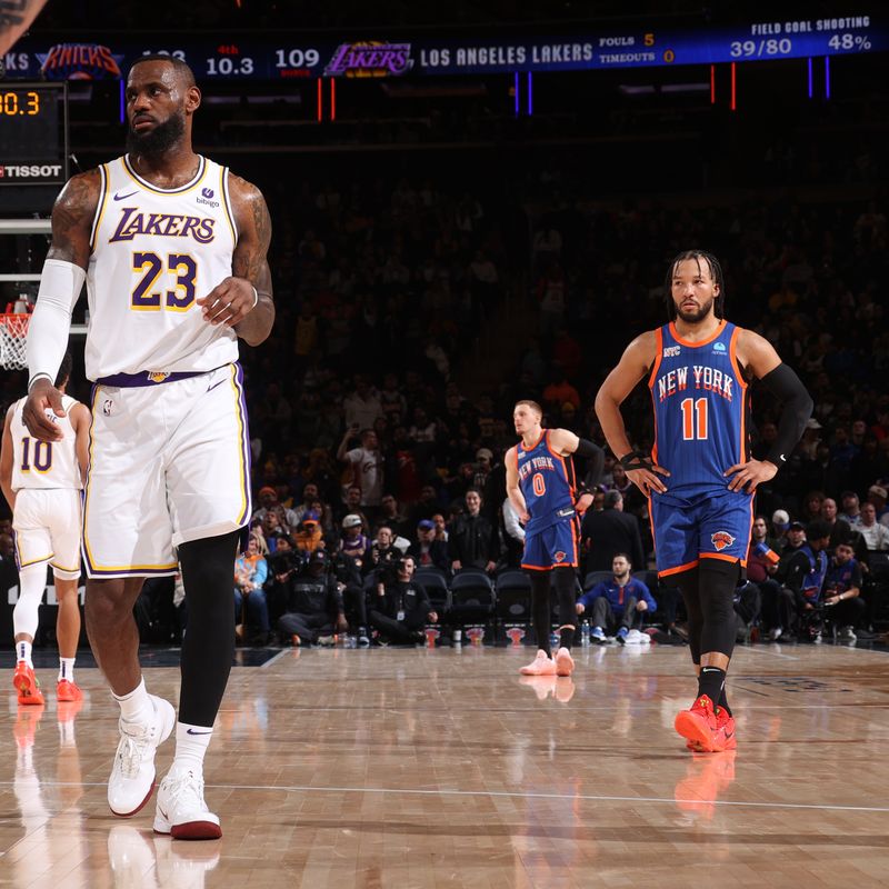 NEW YORK, NY - FEBRUARY 3: LeBron James #23 of the Los Angeles Lakers and Jalen Brunson #11 of the New York Knicks look on during the game on February 3, 2024 at Madison Square Garden in New York City, New York.  NOTE TO USER: User expressly acknowledges and agrees that, by downloading and or using this photograph, User is consenting to the terms and conditions of the Getty Images License Agreement. Mandatory Copyright Notice: Copyright 2024 NBAE  (Photo by Nathaniel S. Butler/NBAE via Getty Images)