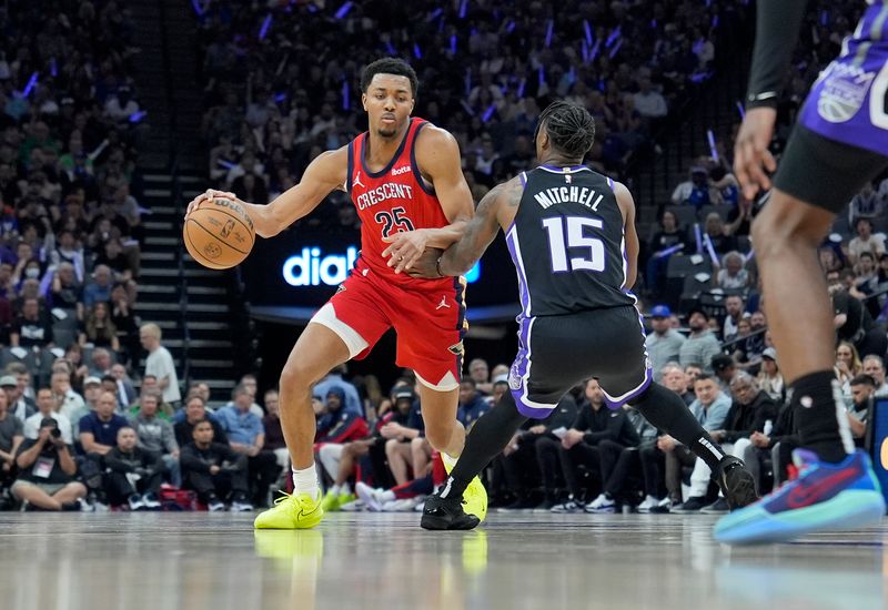 SACRAMENTO, CALIFORNIA - APRIL 11: Trey Murphy III #25 of the New Orleans Pelicans dribbling the ball is guarded by Davion Mitchell #15 of the Sacramento Kings during the first half of an NBA basketball game at Golden 1 Center on April 11, 2024 in Sacramento, California. NOTE TO USER: User expressly acknowledges and agrees that, by downloading and or using this photograph, User is consenting to the terms and conditions of the Getty Images License Agreement. (Photo by Thearon W. Henderson/Getty Images)