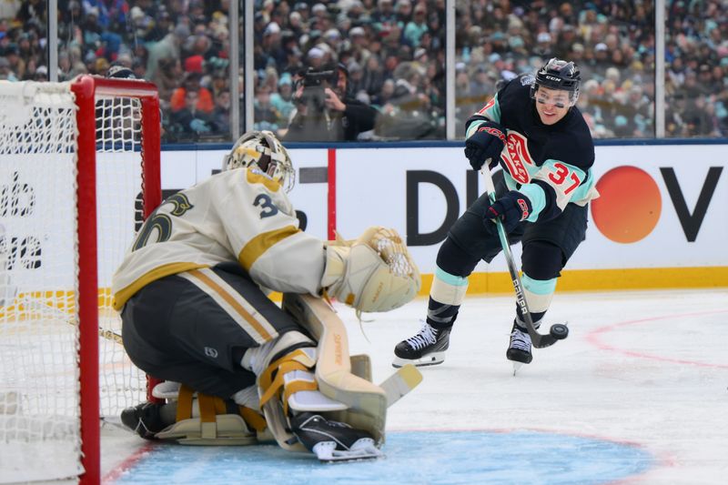 Jan 1, 2024; Seattle, Washington, USA; Seattle Kraken center Yanni Gourde (37) shoots a goal shot towards Vegas Golden Knights goaltender Logan Thompson (36) during the second period in the 2024 Winter Classic ice hockey game at T-Mobile Park. Mandatory Credit: Steven Bisig-USA TODAY Sports