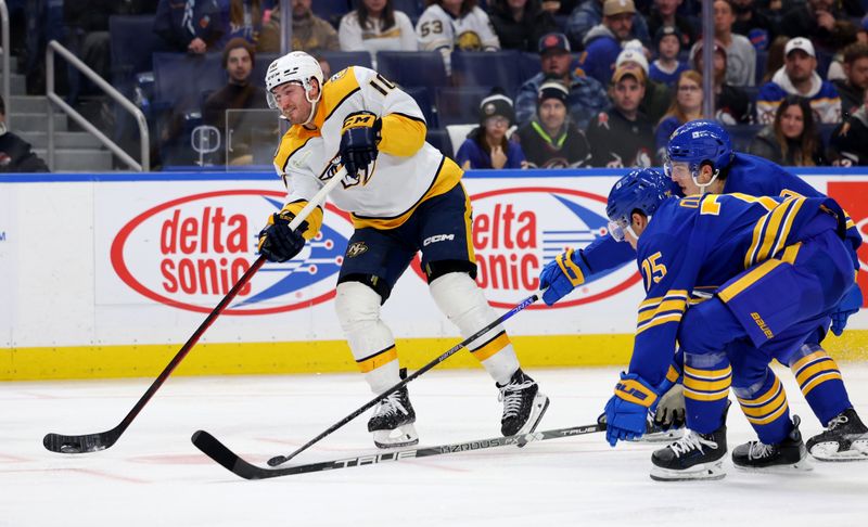 Dec 3, 2023; Buffalo, New York, USA;  Nashville Predators center Colton Sissons (10) takes a shot on goal during the third period against the Buffalo Sabres at KeyBank Center. Mandatory Credit: Timothy T. Ludwig-USA TODAY Sports