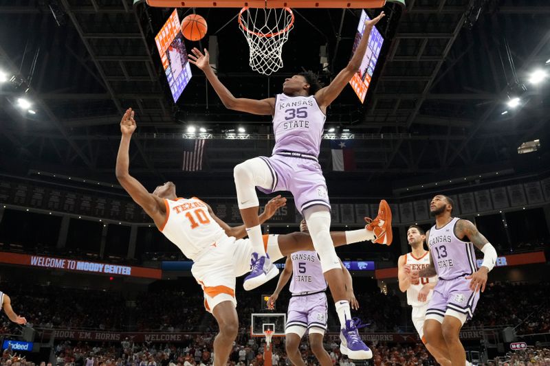 Jan 3, 2023; Austin, Texas, USA; Kansas State Wildcats forward Nae'Qwan Tomlin (35) reaches for a rebound over guard Desi Sills (13) and Texas Longhorns guard Sir'Jabari Rice (10) during the second half at Moody Center. Mandatory Credit: Scott Wachter-USA TODAY Sports