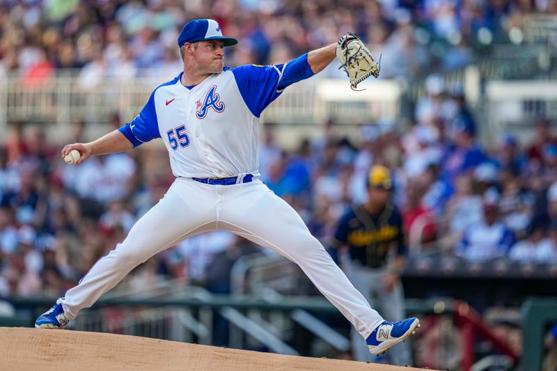 Jul 29, 2023; Cumberland, Georgia, USA; Atlanta Braves starting pitcher Bryce Elder (55) pitches against the Milwaukee Brewers during the first inning at Truist Park. Mandatory Credit: Dale Zanine-USA TODAY Sports