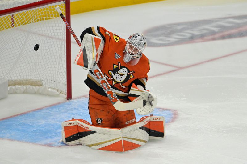 Nov 5, 2024; Anaheim, California, USA; Anaheim Ducks goaltender Lukas Dostal (1) makes a save in the first period against the Vancouver Canucks at Honda Center. Mandatory Credit: Jayne Kamin-Oncea-Imagn Images