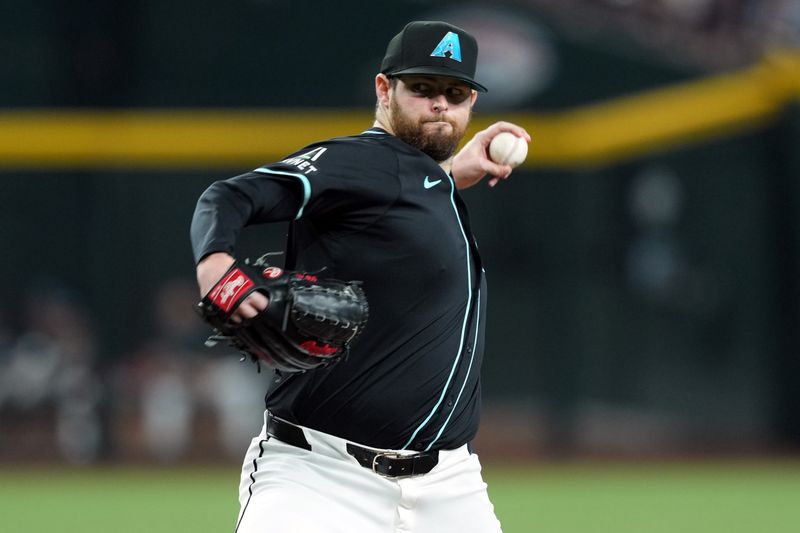 Jun 16, 2024; Phoenix, Arizona, USA; Arizona Diamondbacks pitcher Jordan Montgomery (52) pitches against the Chicago White Sox during the first inning at Chase Field. Mandatory Credit: Joe Camporeale-USA TODAY Sports