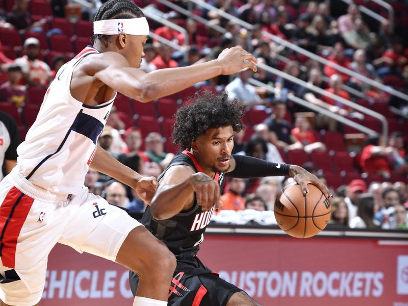 HOUSTON, TX - MARCH 14: Jalen Green #4 of the Houston Rockets dribbles the ball during the game against the Washington Wizards on March 14, 2024 at the Toyota Center in Houston, Texas. NOTE TO USER: User expressly acknowledges and agrees that, by downloading and or using this photograph, User is consenting to the terms and conditions of the Getty Images License Agreement. Mandatory Copyright Notice: Copyright 2024 NBAE (Photo by Logan Riely/NBAE via Getty Images)