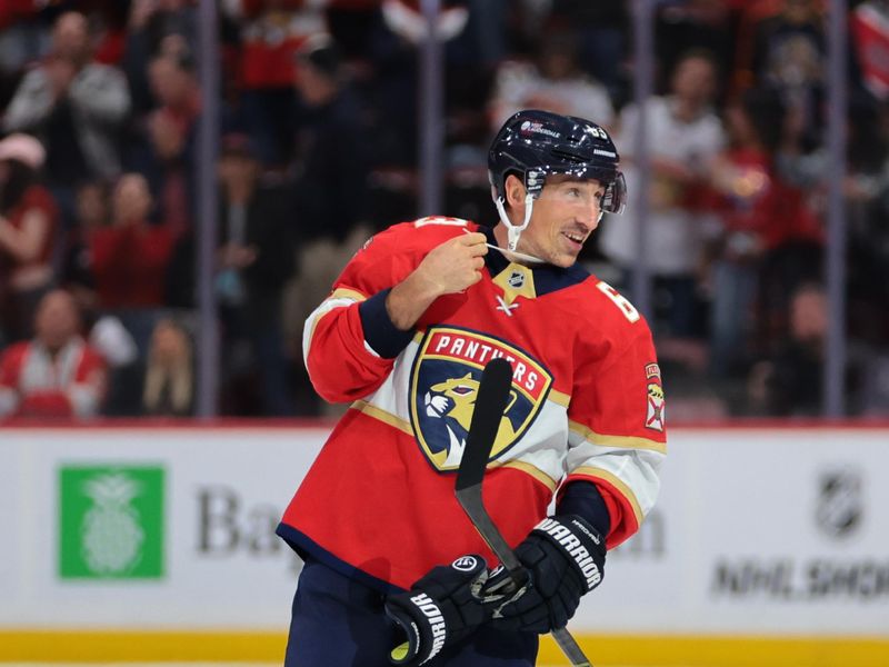 Nov 1, 2025; Sunrise, Florida, USA; Florida Panthers left wing Brad Marchand (63) looks on after scoring against the Dallas Stars during the second period at Amerant Bank Arena. Mandatory Credit: Sam Navarro-Imagn Images