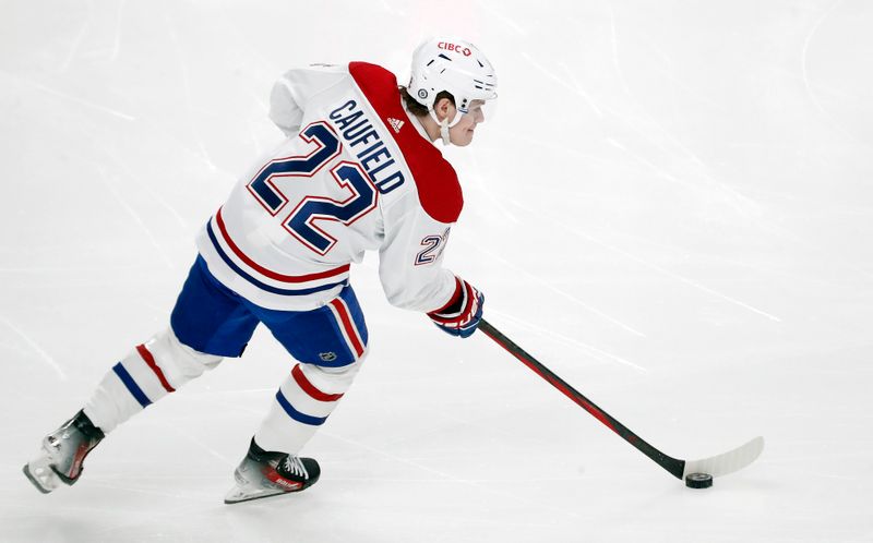 Feb 22, 2024; Pittsburgh, Pennsylvania, USA;  Montreal Canadiens right wing Cole Caufield (22) warms up before the game against the Pittsburgh Penguins at PPG Paints Arena. Mandatory Credit: Charles LeClaire-USA TODAY Sports