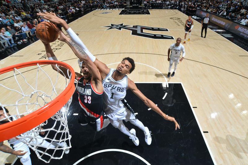 SAN ANTONIO, TX - NOVEMBER 7:  Victor Wembanyama #1 of the San Antonio Spurs blocks the basket during the game against the Portland Trail Blazers on November 7, 2024 at the Frost Bank Center in San Antonio, Texas. NOTE TO USER: User expressly acknowledges and agrees that, by downloading and or using this photograph, user is consenting to the terms and conditions of the Getty Images License Agreement. Mandatory Copyright Notice: Copyright 2024 NBAE (Photos by Michael Gonzales/NBAE via Getty Images)