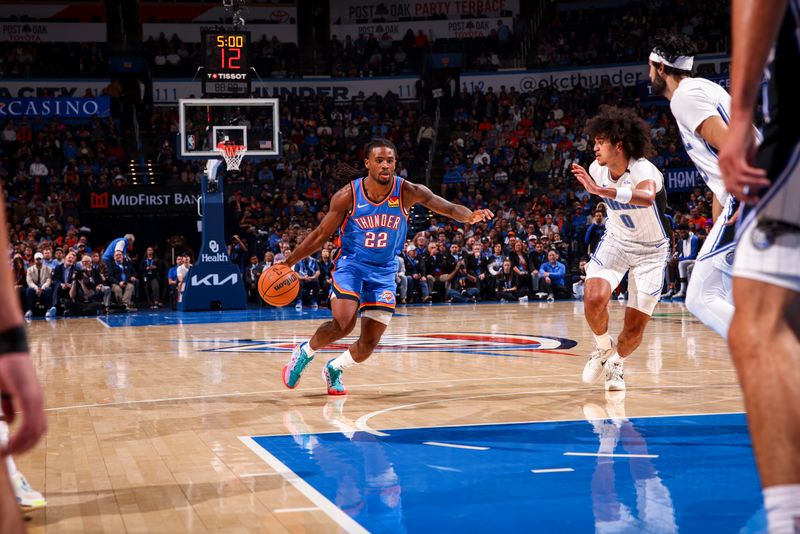 OKLAHOMA CITY, OK - NOVEMBER 4:  Cason Wallace #22 of the Oklahoma City Thunder dribbles the ball during the game against the Orlando Magic on November 4, 2024 at Paycom Center in Oklahoma City, Oklahoma. NOTE TO USER: User expressly acknowledges and agrees that, by downloading and or using this photograph, User is consenting to the terms and conditions of the Getty Images License Agreement. Mandatory Copyright Notice: Copyright 2024 NBAE (Photo by Zach Beeker/NBAE via Getty Images)