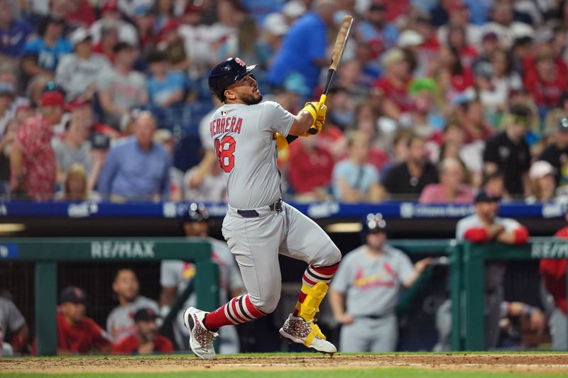 May 12, 2025; Philadelphia, Pennsylvania, USA; St. Louis Cardinals catcher Ivan Herrera (48) hits a home run against the Philadelphia Phillies in the sixth inning at Citizens Bank Park. Mandatory Credit: Kyle Ross-Imagn Images