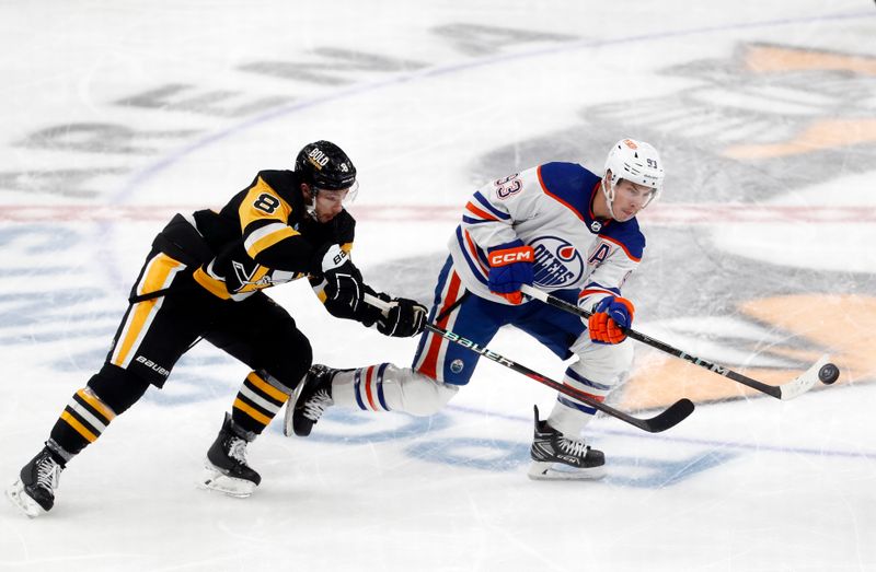 Mar 10, 2024; Pittsburgh, Pennsylvania, USA;  Edmonton Oilers center Ryan Nugent-Hopkins (93) moves the puck against Pittsburgh Penguins left wing Michael Bunting (8) during the third period at PPG Paints Arena. The Oilers won 4-0. Mandatory Credit: Charles LeClaire-USA TODAY Sports