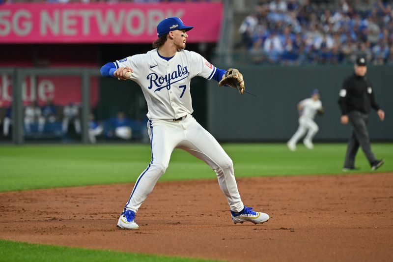 Oct 9, 2024; Kansas City, Missouri, USA; Kansas City Royals shortstop Bobby Witt Jr. (7) fields a ball in the third inning against the New York Yankees during game three of the NLDS for the 2024 MLB Playoffs at Kauffman Stadium. Mandatory Credit: Peter Aiken-Imagn Images