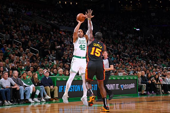 BOSTON, MA - November 26: Al Horford #42 of the Boston Celtics shoots a three point basket during the game against the Atlanta Hawks on November 26, 2023 at the TD Garden in Boston, Massachusetts. NOTE TO USER: User expressly acknowledges and agrees that, by downloading and or using this photograph, User is consenting to the terms and conditions of the Getty Images License Agreement. Mandatory Copyright Notice: Copyright 2023 NBAE  (Photo by Brian Babineau/NBAE via Getty Images)