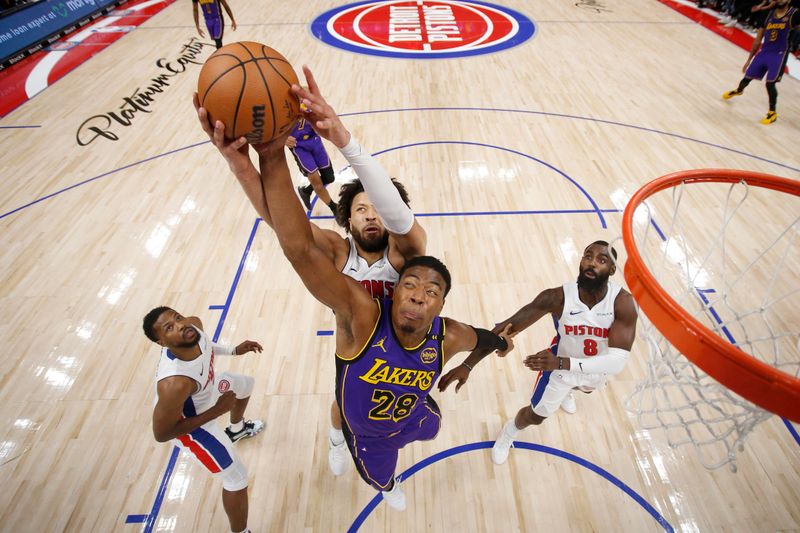 DETROIT, MI - NOVEMBER 4: Rui Hachimura #28 of the Los Angeles Lakers blocks the ball during the game against the Detroit Pistons on November 4, 2024 at Little Caesars Arena in Detroit, Michigan. NOTE TO USER: User expressly acknowledges and agrees that, by downloading and/or using this photograph, User is consenting to the terms and conditions of the Getty Images License Agreement. Mandatory Copyright Notice: Copyright 2024 NBAE (Photo by Brian Sevald/NBAE via Getty Images)