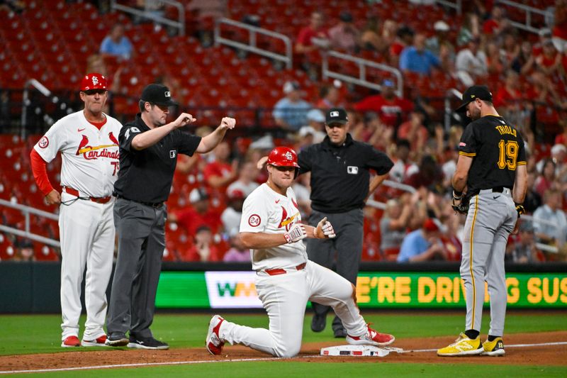 Sep 17, 2024; St. Louis, Missouri, USA;  St. Louis Cardinals designated hitter Luken Baker (26) reacts after hitting a one run triple against the Pittsburgh Pirates during the third inning at Busch Stadium. Mandatory Credit: Jeff Curry-Imagn Images