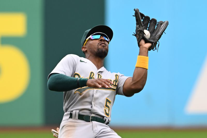 Jun 22, 2023; Cleveland, Ohio, USA; Oakland Athletics left fielder Tony Kemp (5) catches a ball hit by Cleveland Guardians first baseman Josh Bell (not pictured) during the eighth inning at Progressive Field. Mandatory Credit: Ken Blaze-USA TODAY Sports