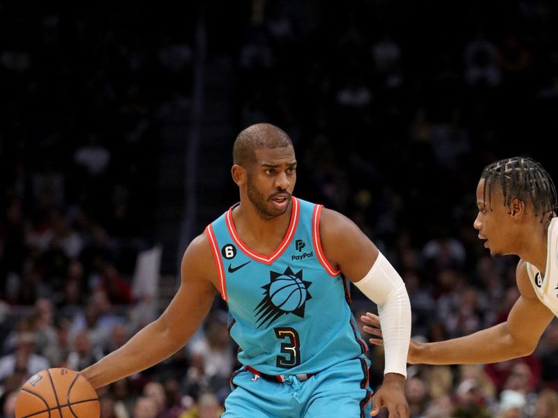 CLEVELAND, OH - JANUARY 4: Chris Paul #3 of the Phoenix Suns handles the ball during the game against the Cleveland Cavaliers  on January 4, 2023 at Rocket Mortgage FieldHouse in Cleveland, Ohio. NOTE TO USER: User expressly acknowledges and agrees that, by downloading and/or using this Photograph, user is consenting to the terms and conditions of the Getty Images License Agreement. Mandatory Copyright Notice: Copyright 2022 NBAE (Photo by Lauren Bacho/NBAE via Getty Images)