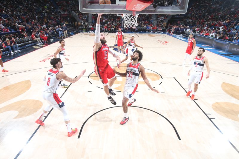 NEW ORLEANS, LA - FEBRUARY 14: Jonas Valanciunas #17 of the New Orleans Pelicans drives to the basket during the game against the Washington Wizards on February 14, 2024 at the Smoothie King Center in New Orleans, Louisiana. NOTE TO USER: User expressly acknowledges and agrees that, by downloading and or using this Photograph, user is consenting to the terms and conditions of the Getty Images License Agreement. Mandatory Copyright Notice: Copyright 2024 NBAE (Photo by Layne Murdoch Jr./NBAE via Getty Images)