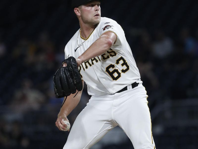 Sep 5, 2023; Pittsburgh, Pennsylvania, USA; Pittsburgh Pirates relief pitcher Hunter Stratton (63) pitches in his major league debut against the Milwaukee Brewers during the eighth inning at PNC Park. The Brewers won 7-3. Mandatory Credit: Charles LeClaire-USA TODAY Sports