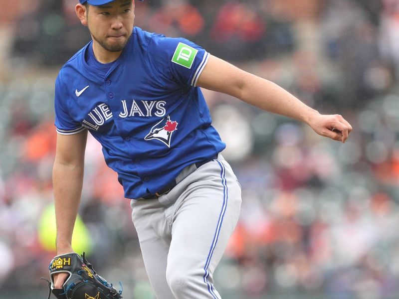 May 15, 2024; Baltimore, Maryland, USA; Toronto Blue Jays pitcher Yusei Kikuchi (39) delivers a pitch in the second inning against the Baltimore Orioles at Oriole Park at Camden Yards. Mandatory Credit: Mitch Stringer-USA TODAY Sports