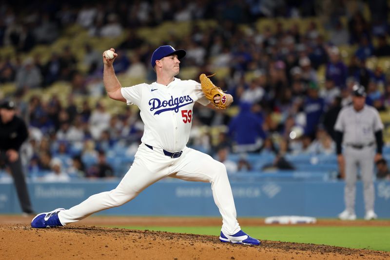 Jun 1, 2024; Los Angeles, California, USA;  Los Angeles Dodgers relief pitcher Evan Phillips (59) pitches during the ninth inning against the Colorado Rockies at Dodger Stadium. Mandatory Credit: Kiyoshi Mio-USA TODAY Sports