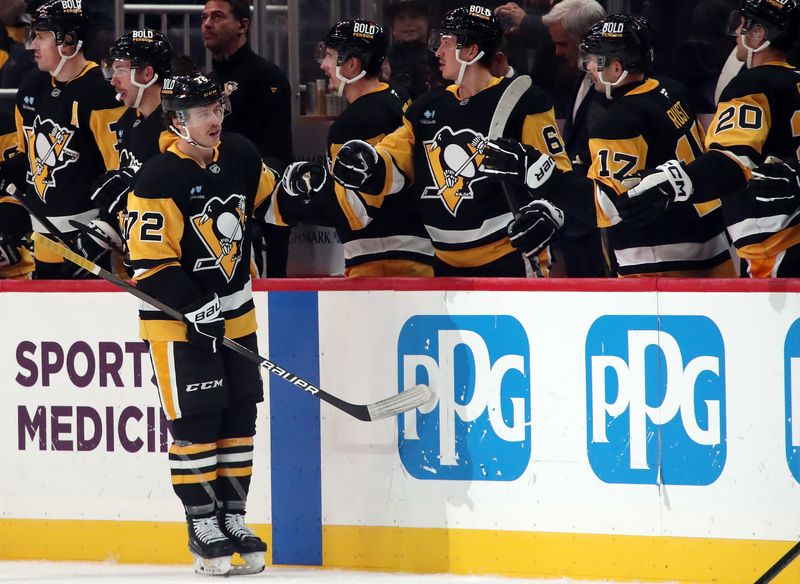 Nov 11, 2024; Pittsburgh, Pennsylvania, USA;  Pittsburgh Penguins left wing Anthony Beauvillier (72) celebrates his goal with the Penguins bench against the Dallas Stars during the second period at PPG Paints Arena. Mandatory Credit: Charles LeClaire-Imagn Images