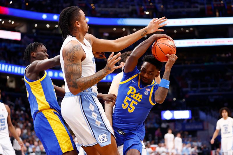 Mar 15, 2024; Washington, D.C., USA; Pittsburgh Panthers forward Zack Austin (55) controls the ball as Pittsburgh Panthers guard Ishmael Leggett (5) defends during the first half at Capital One Arena. Mandatory Credit: Amber Searls-USA TODAY Sports