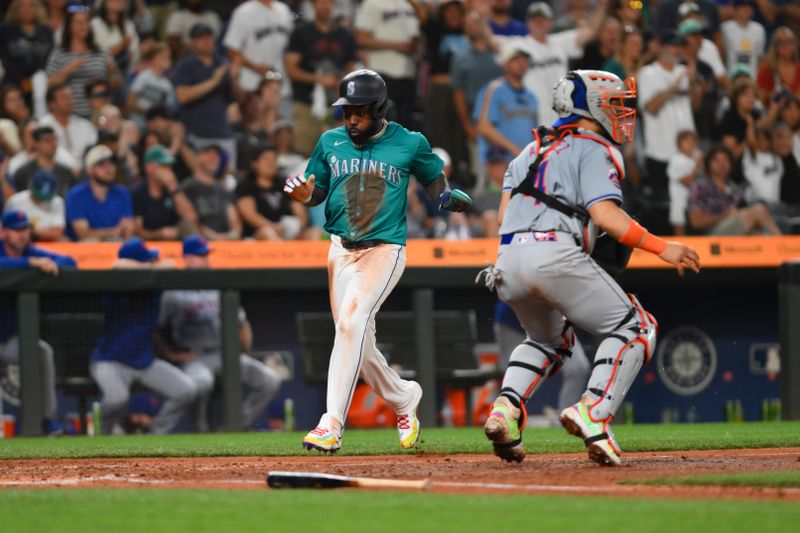 Aug 10, 2024; Seattle, Washington, USA; Seattle Mariners left fielder Randy Arozarena (56) scores a run against the New York Mets during the seventh inning at T-Mobile Park. Mandatory Credit: Steven Bisig-USA TODAY Sports