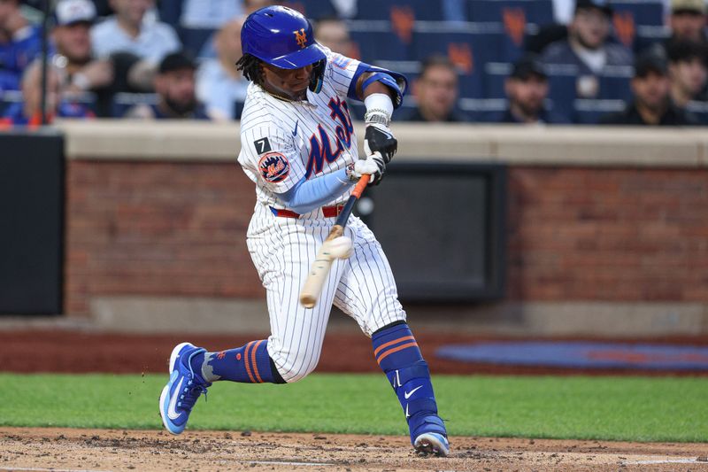 Apr 29, 2025; New York City, New York, USA; New York Mets second baseman Luisangel Acuna (2) singles during the second inning against the Arizona Diamondbacks at Citi Field. Mandatory Credit: Vincent Carchietta-Imagn Images